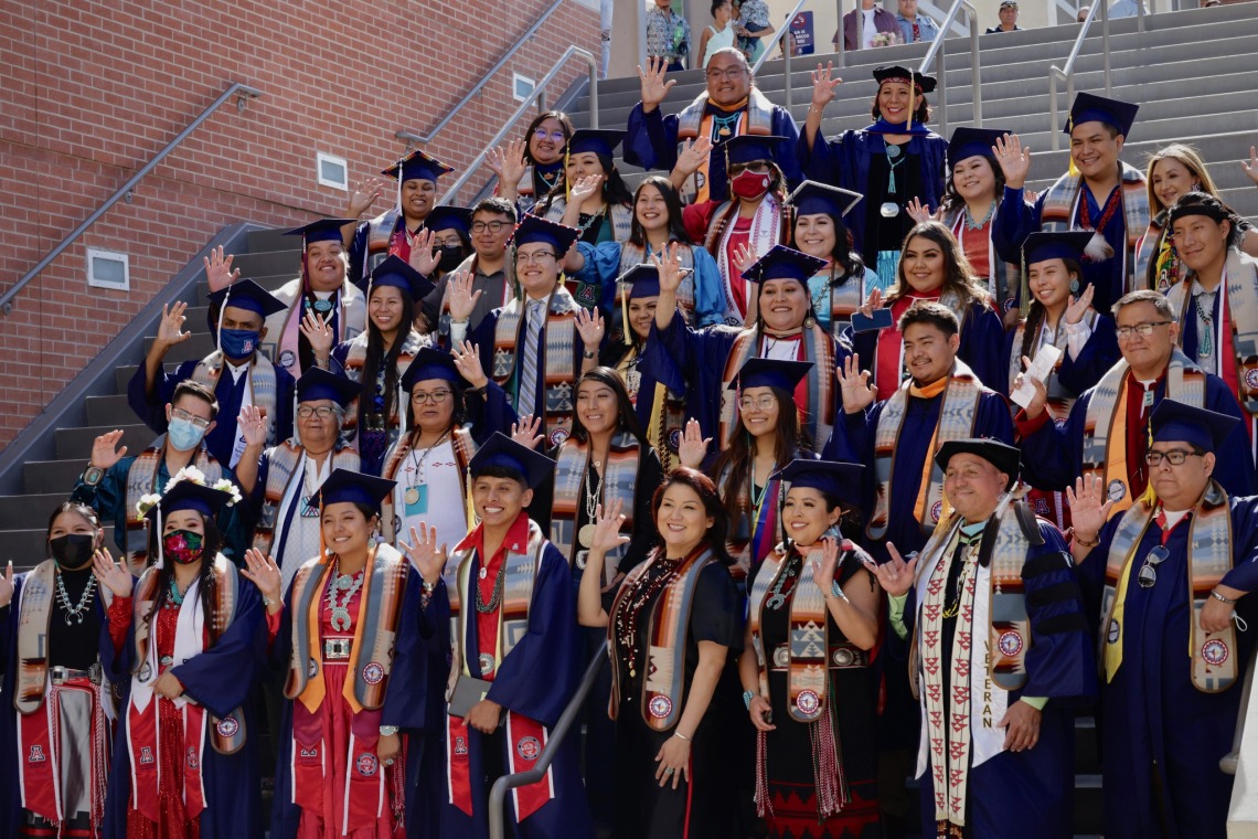 Group photo of graduates taken on the steps outside of the student union memorial center that participated in NASA Convocation.