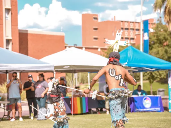 Crown Dancers from the White Mountain Apache Tribe dancing during Indigenous Peoples Day