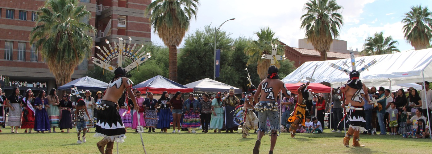 Photo from Indigenous Peoples' Day featuring Crown Dancers from the White Mountain Apache Tribe