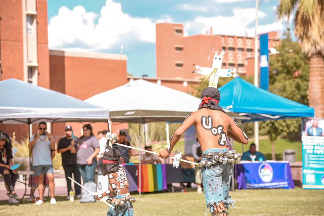 Crown Dancers from the White Mountain Apache Tribe dancing during Indigenous Peoples Day