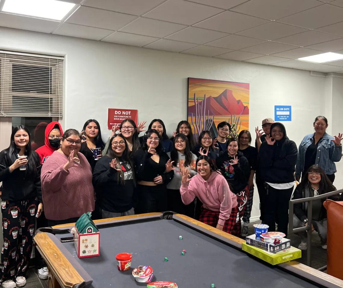 Group photo of O'odham Ki: Residents and American Indian Alumni club members during the O'odham Ki: Winter Social.